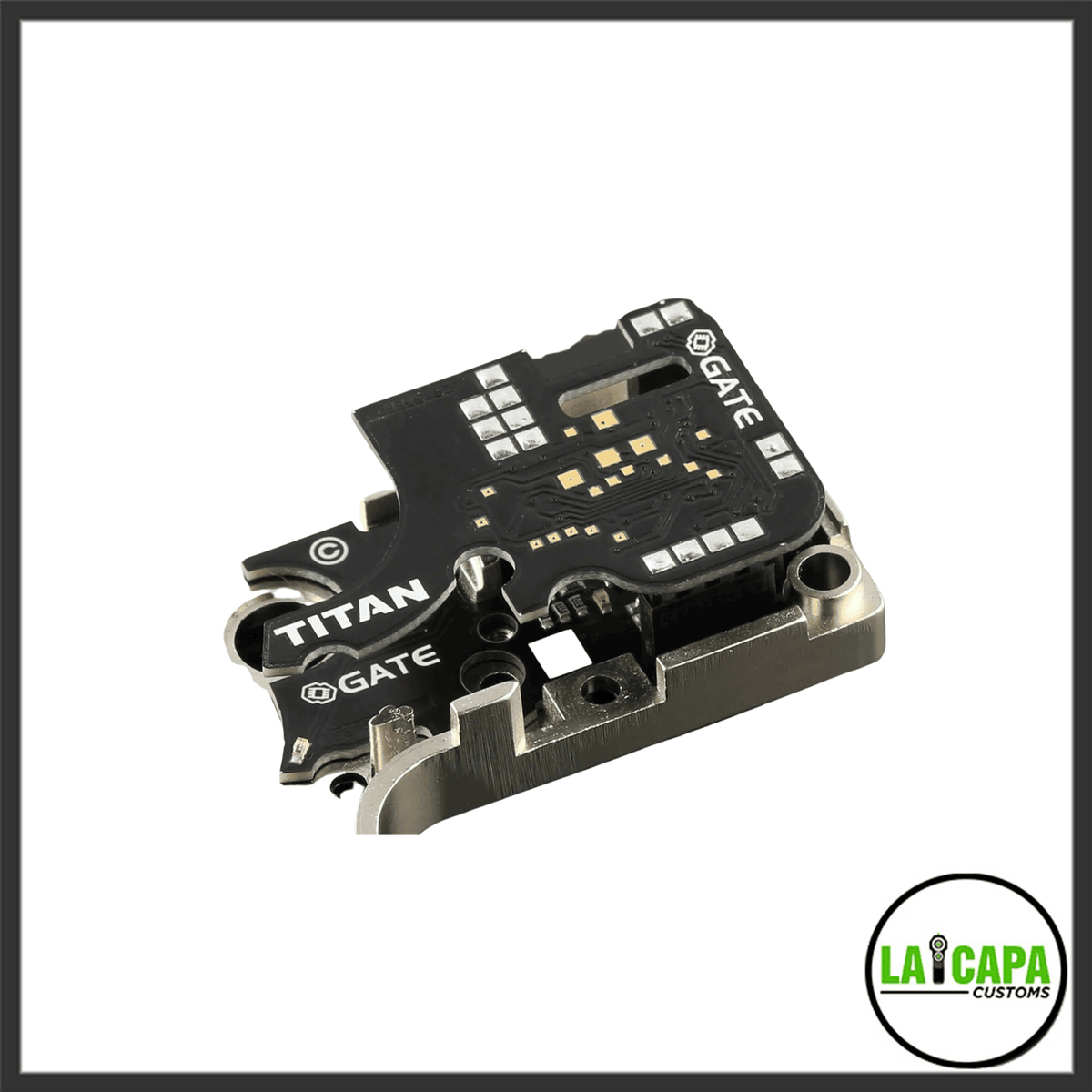Gate Titan V2 MOSFET module shown from a low angled top view, displaying the PCB circuit board and metal trigger contacts.
