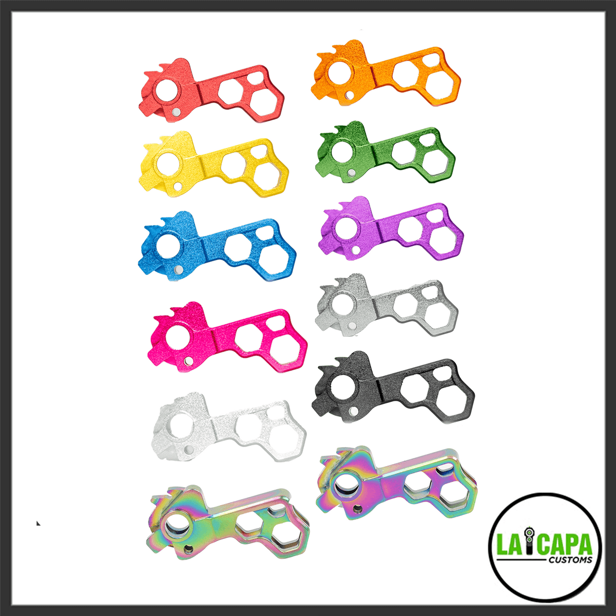 LA Capa Customs Hi-Capa hammers shown in nine anodized color variants including red, orange, yellow, green, blue, purple, pink, silver, grey, black, and rainbow.