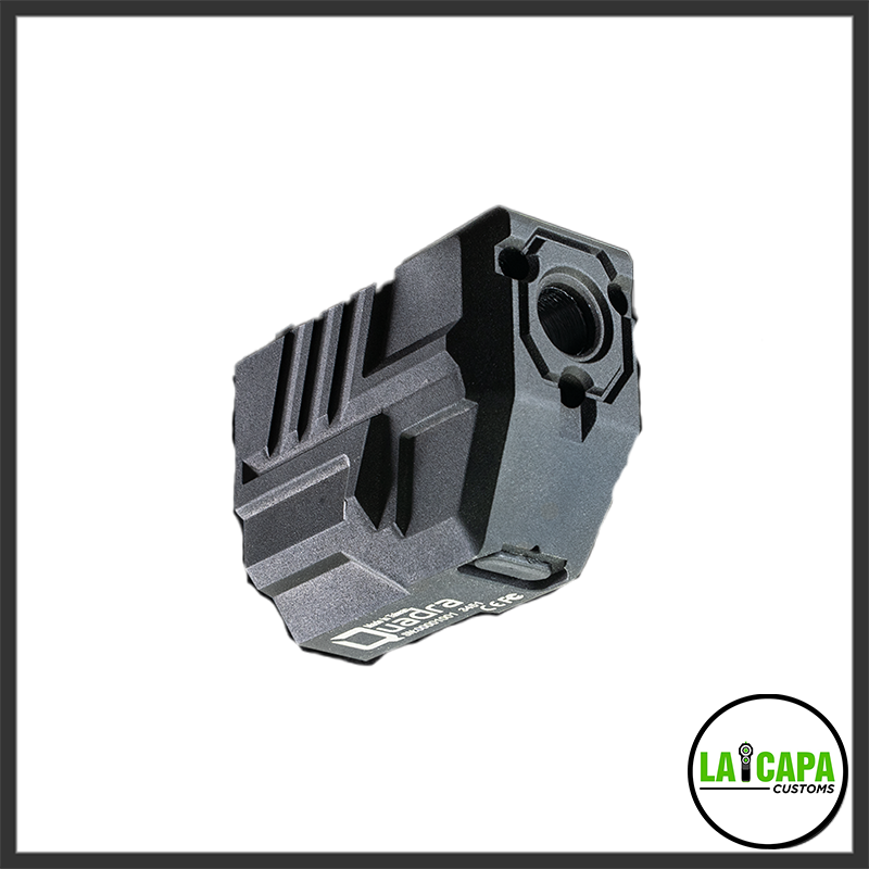 Acetech Quadra tracer unit in dark grey, shown at an angle revealing the muzzle-end lens and ribbed body.
