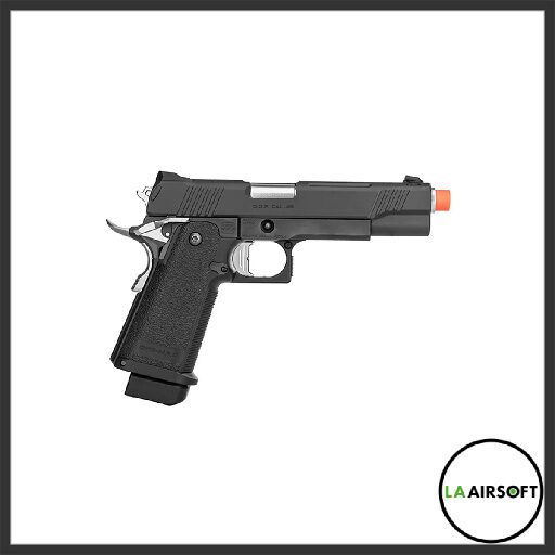 Black Hi-Capa style airsoft pistol with silver hammer and orange muzzle tip, left-side view showing textured grip and extended magazine base.