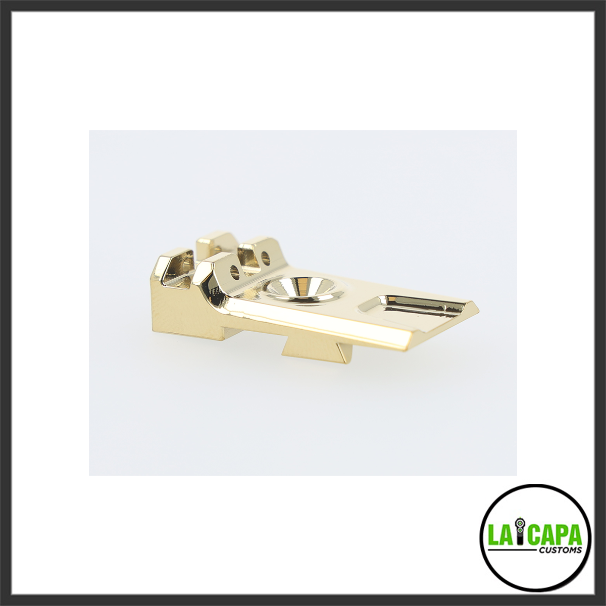 LA Capa Customs Lightweight 5.1 Fiber Optic Rear Sight in gold chrome finish, shown at an angle revealing the sight channel and mounting base.