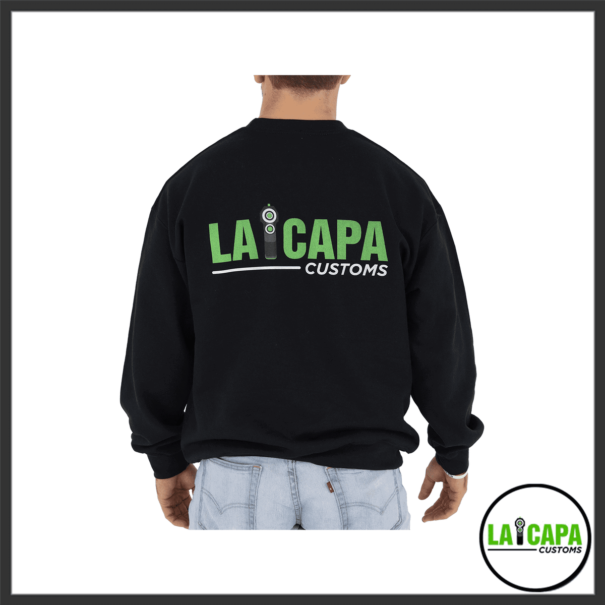 Back view of a black LA Capa Customs crewneck sweatshirt worn by a male model, showing the large green and white LA Capa Customs logo printed across the upper back.