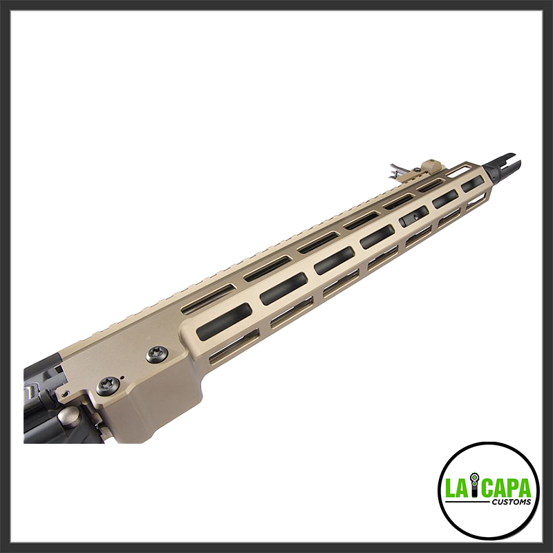Close-up of the flat dark earth M-LOK handguard on the Tokyo Marui x Colt URG-I SOPMOD Block 3 AEG, showing the slotted rail cuts and muzzle device at the far end.