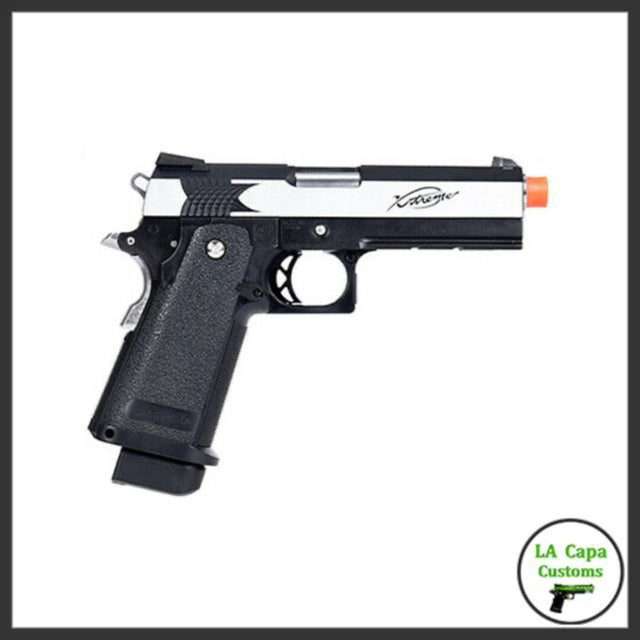 Tokyo Marui Hi-Capa Xtreme .45 full-auto GBB airsoft pistol in two-tone black and silver, left-side profile with orange muzzle tip.